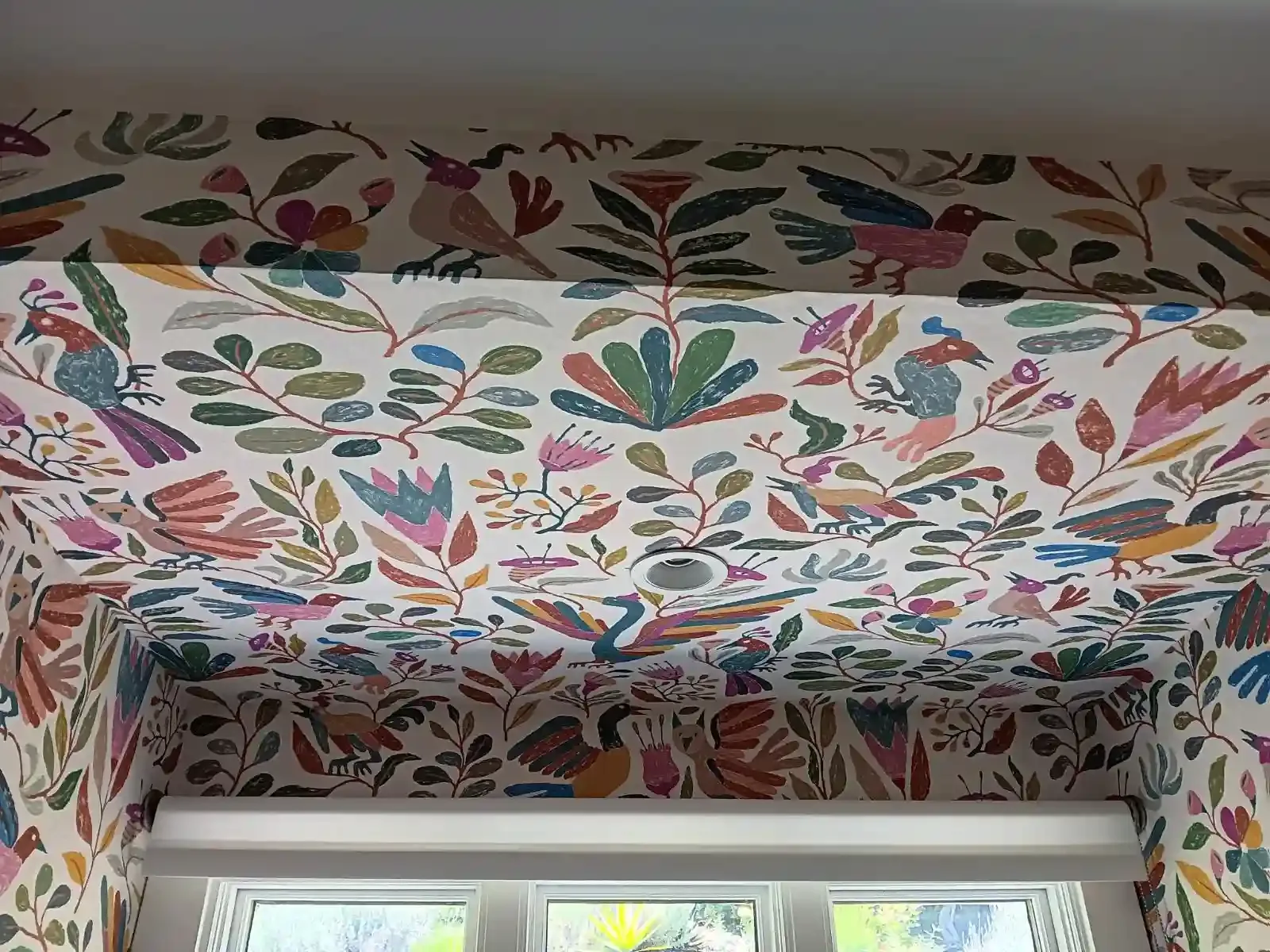 Close view of a colorful botanical wallpaper pattern
