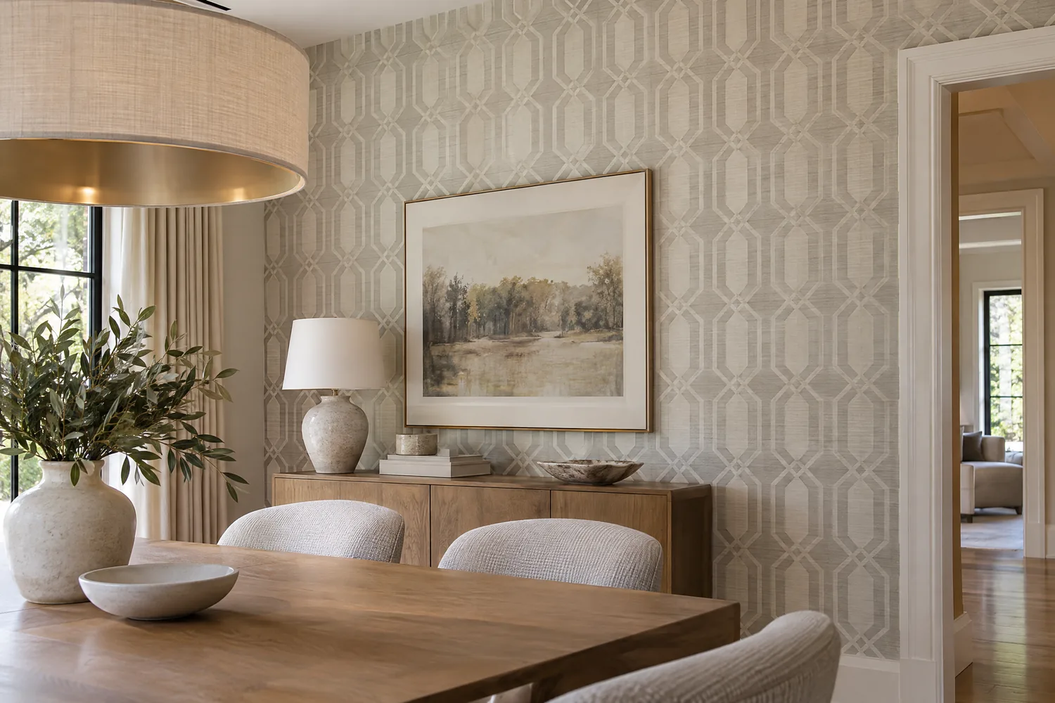 A pale geometric wallpaper pattern on a dining-room wall